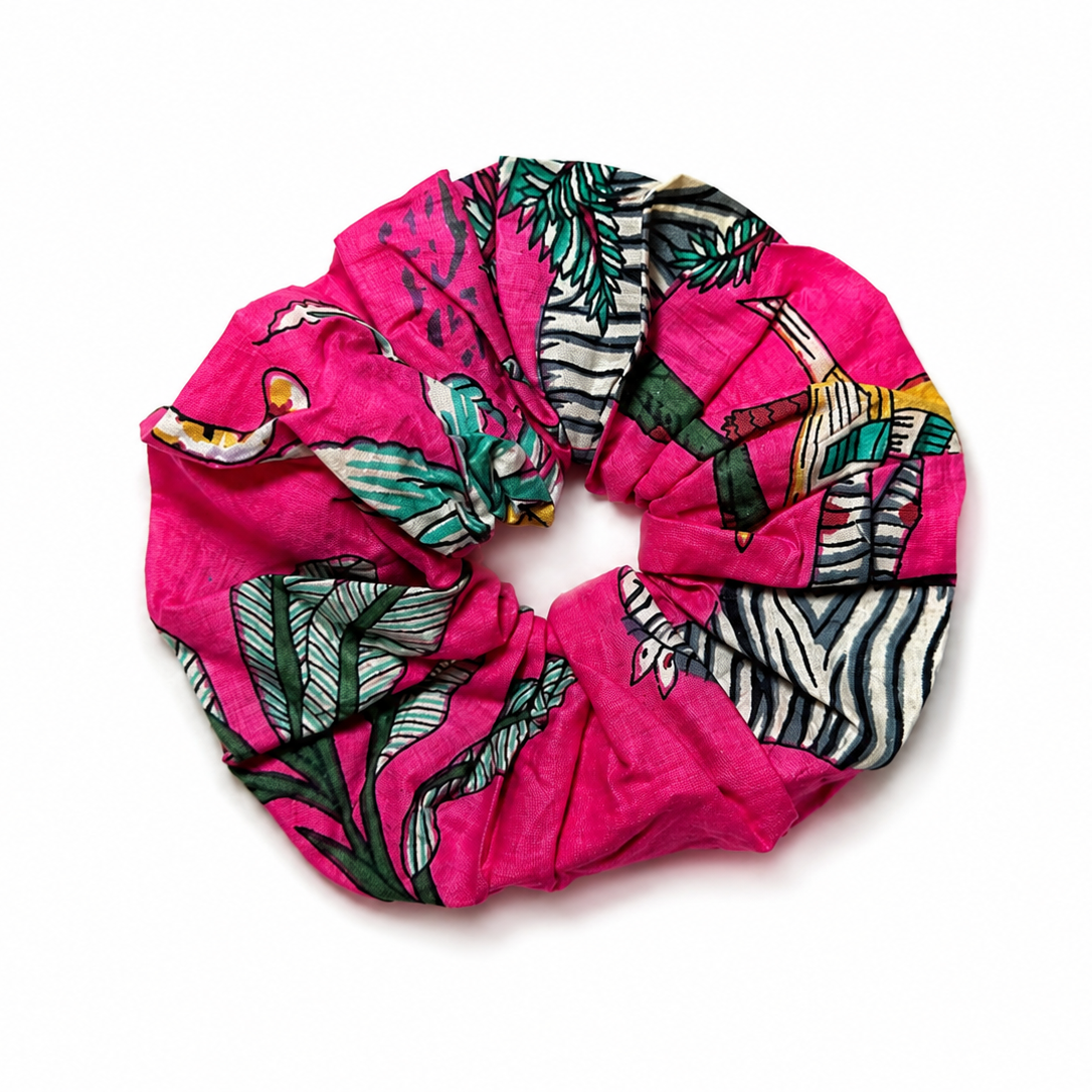 Colorful scrunchie with animal print on a white background